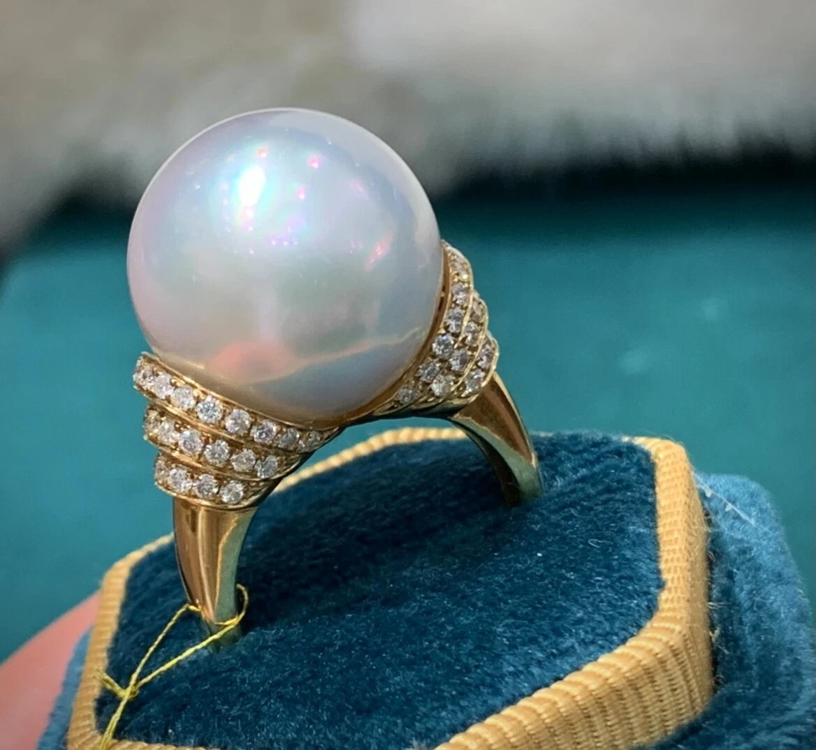 Pearl ring with diamonds around it discount