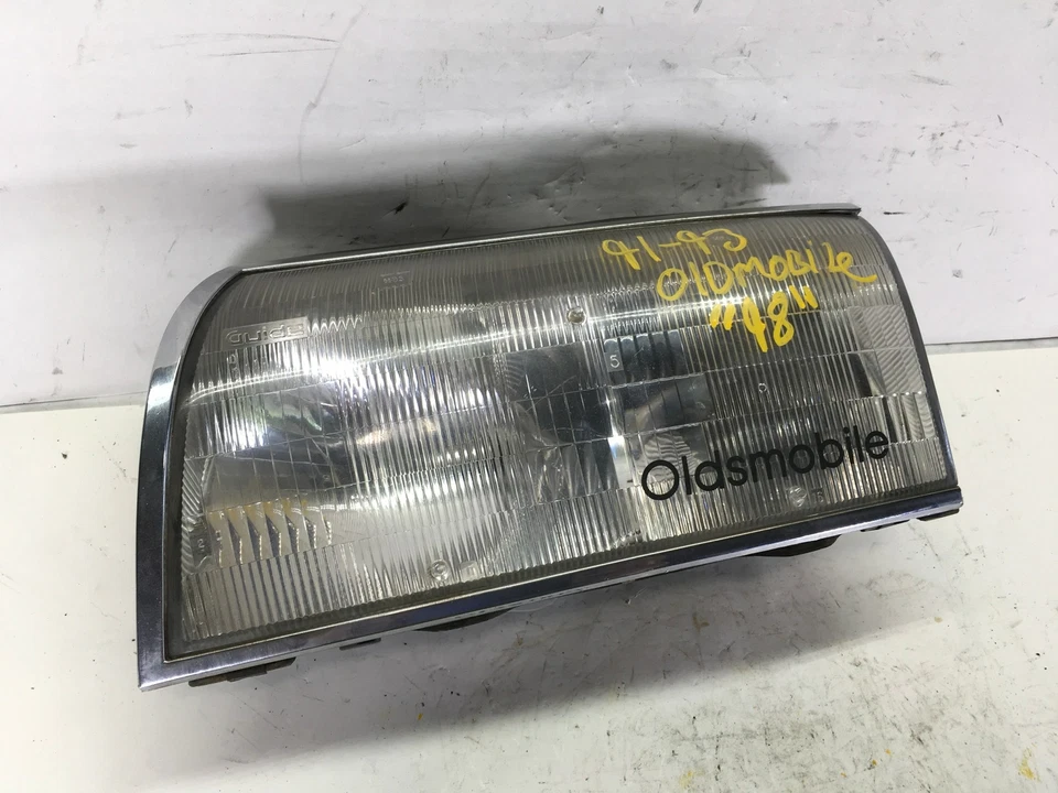 Oldsmobile 98 1992 faro delantero izquierdo conductor lámpara halógena con bombillas OEM+ Foto 2 de 4