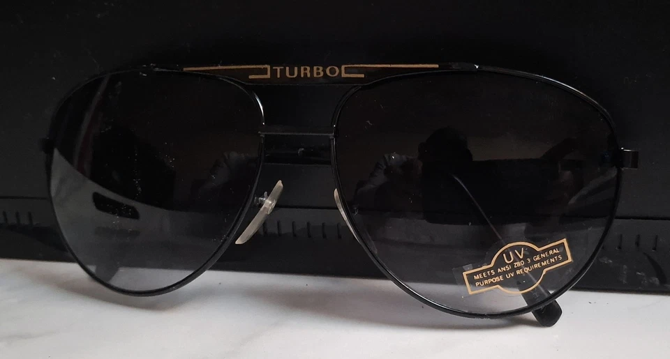 Gafas de sol Turbo Aviator con lente oscura y marco de metal Foto 3 de 4