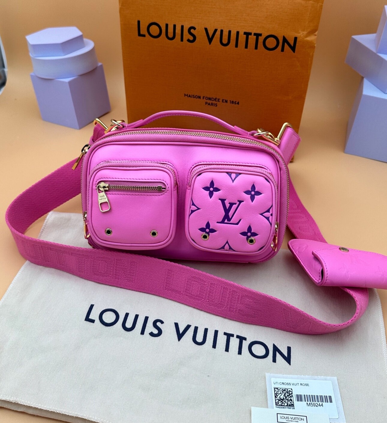 LOUIS VUITTON UTILITY PINK CROOSBODY BAG