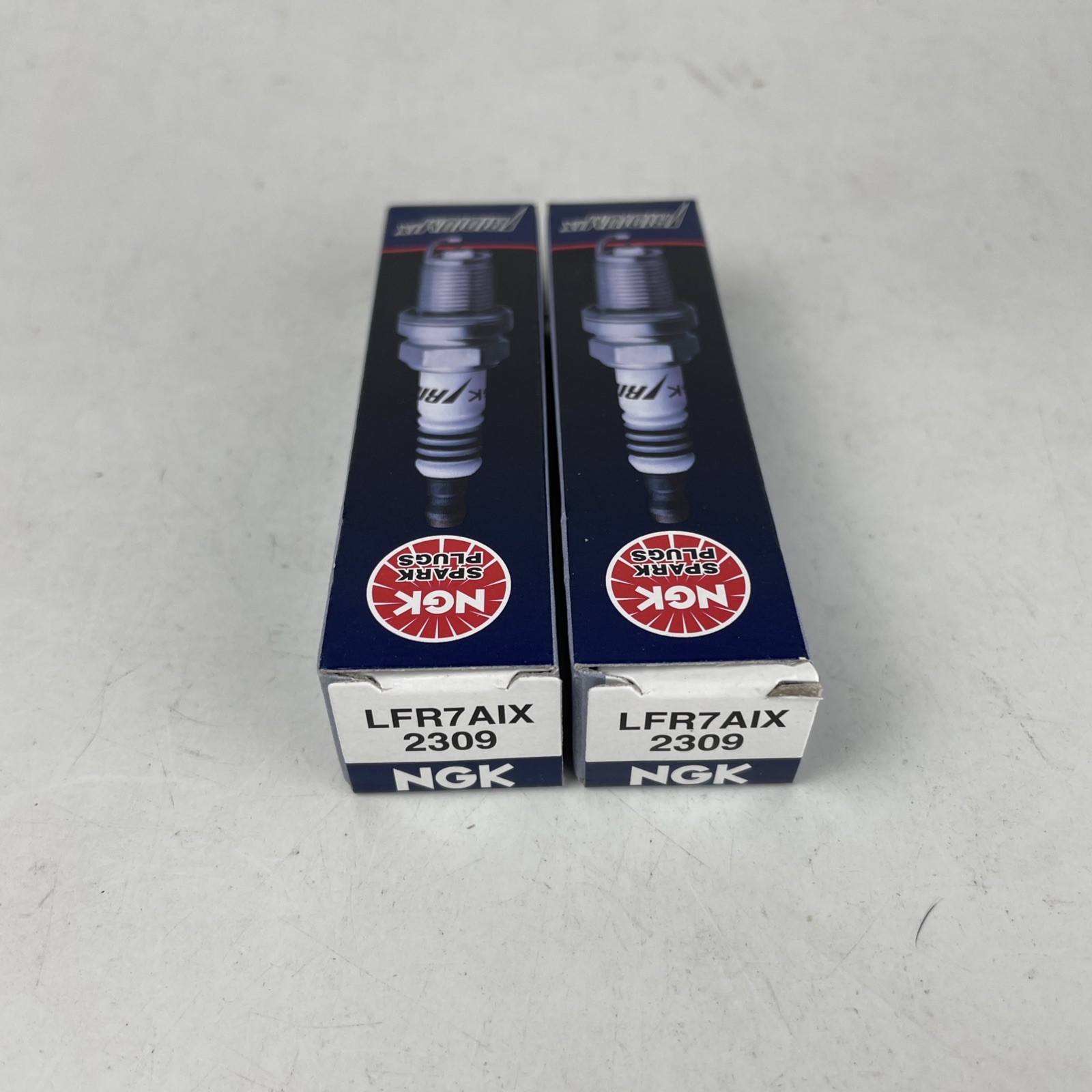Pair of New in Sleeve Genuine NGK LFR7AIX 2309 NGK Iridium IX spark plugs.
