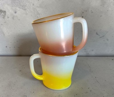 Retro Fire King D-handle milk glass mugs featuring a ombré fade effect. Pair.