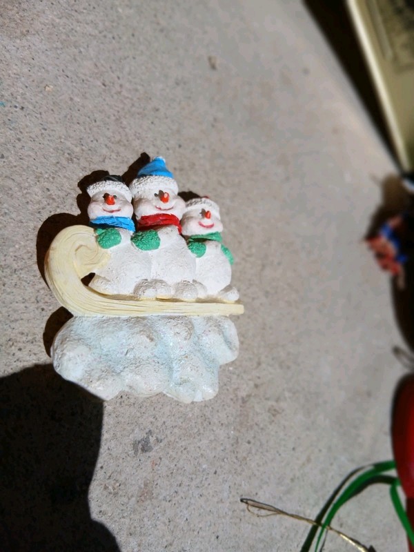 Young's Inc. snowman family ornament