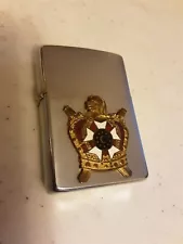1965 Zippo lighter. 5 barrel hinge - 16 hole insert. Masonic symbol