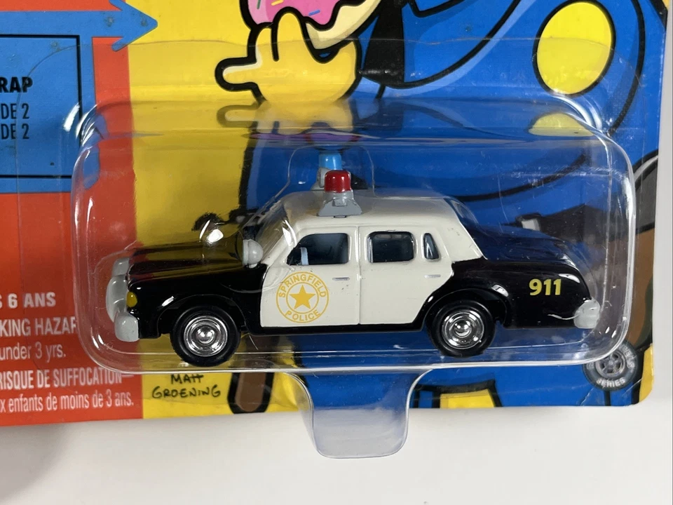 Johnny Lightning The Simpsons Chief Wiggum’s Police Cruiser On Sealed Card - Image 2 of 4
