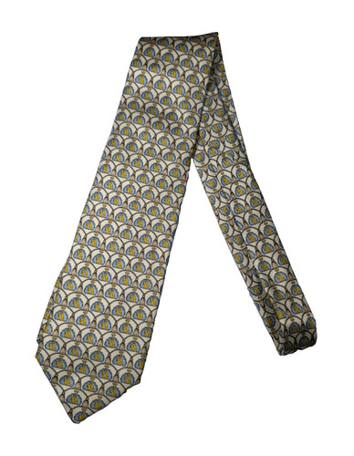 Diana de Silva Italian Silk tie w/ Blue and Yellow over Cream “Le Flacon” motif.