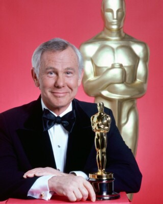 Johnny Carson 24x36 inch Poster posing with Academy Awards as host