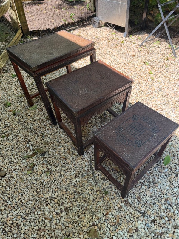 Vintage Chinese export nesting tables from 1950–1970 featuring woven rattan tops