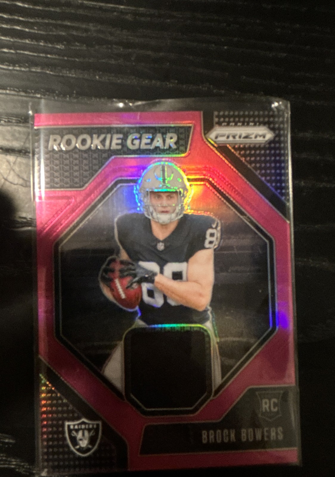 2024 Panini Prizm - Rookie Gear Brock Bowers #RG-BBS Pink Prizm (MEM, RC)