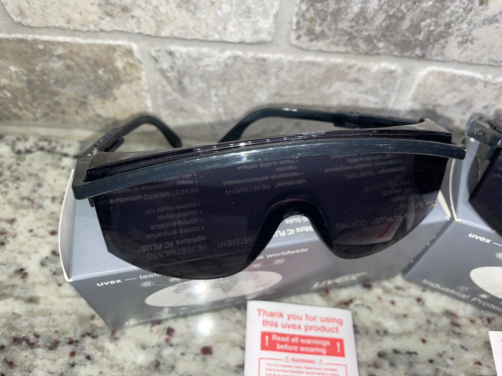 9 Pair New UVEX Astrospec 3000 Safety Glasses Black Frame Gray Lens
