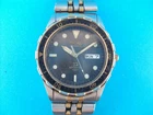 VINTAGE MEN'S SEIKO 7N43-7A49 QUARTZ WATCH--BLACK DIAL--TWO TONE--PARTS/REPAIR