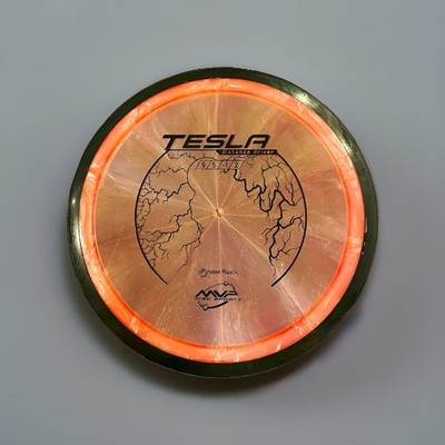MVP Disc Sports Tesla Proton Distance Driver Disc, Pink/Black 173-5g (9/5/-1/2)