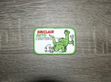 Sinclair Auto Centers Green Dino Embroidered Iron On Patch 3.25" x 2"