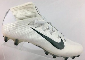 green and white football boots