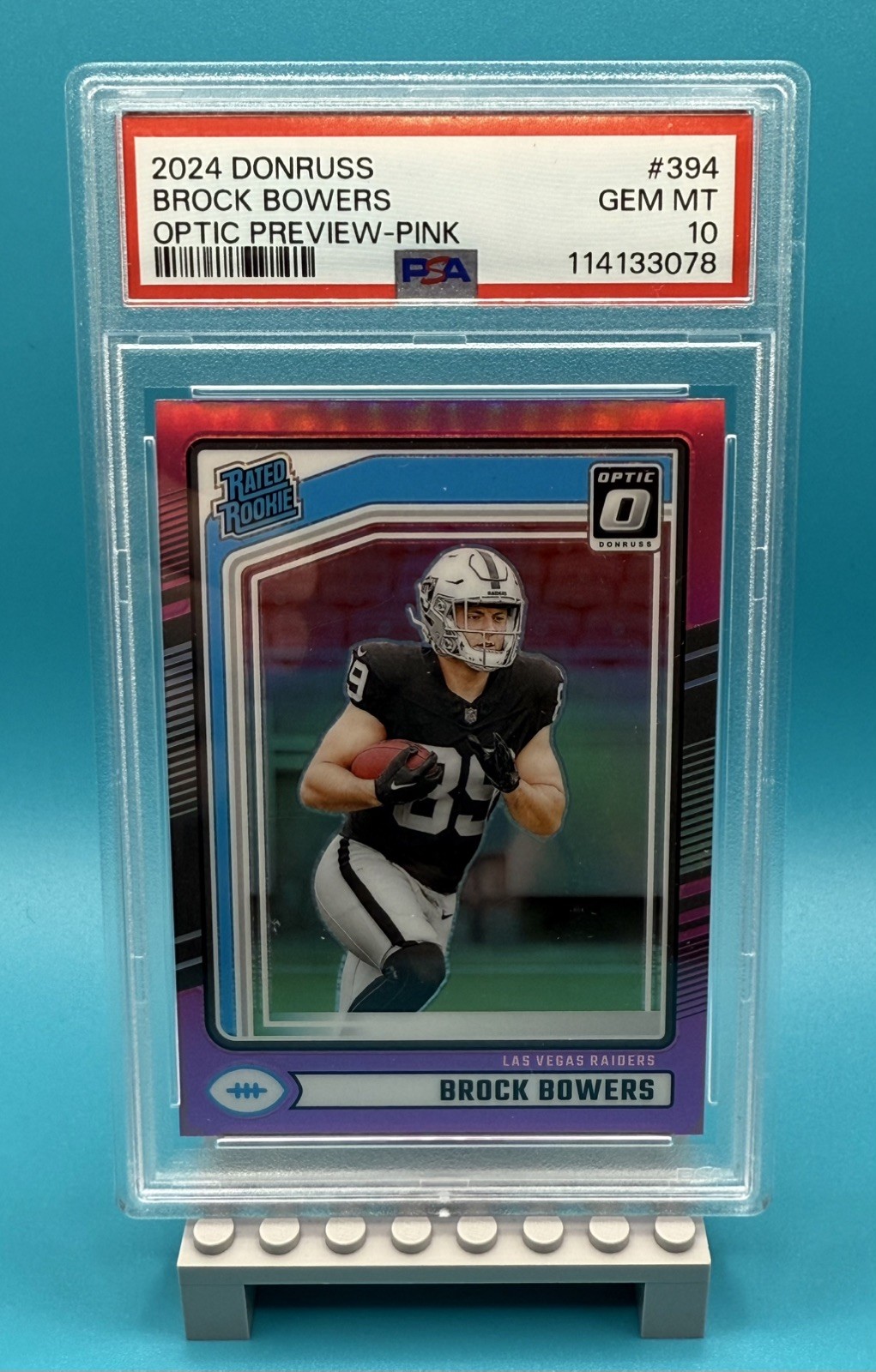 2024 Panini Donruss Brock Bowers #394 Optic Preview Pink PSA 10