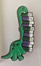DINOSAURIO CON LIBROS-PIN-2 O MÁS PINES $5.49 ENVÍO-GASTA $20 ENVÍO ES GRATIS