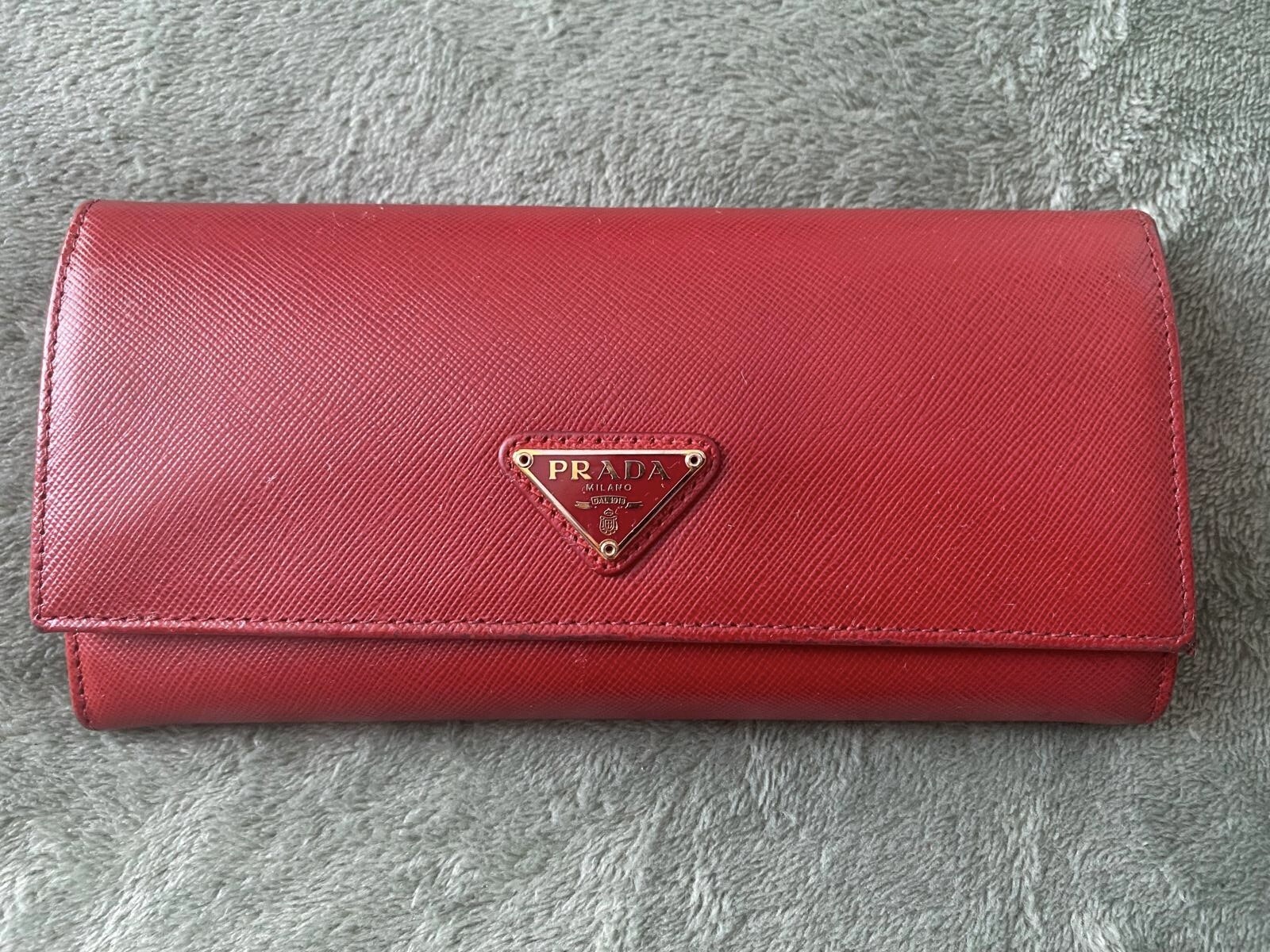 Prada Red Saffiano Leather Long Large Wallet / Purse with gold details.