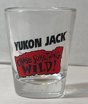 Novelty Clear Glass Shot Glass '' Yukon Jack, Chase Something Wild '' 1.5 ounce
