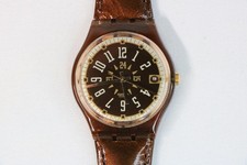 Swatch Quartz Watch Brown Dial 24-Hour Date Skeleton Back Working w/Box