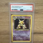 1999 Pokemon Base Set Unlimited Alakazam #1 Holo Near Mint PSA 7 Free shipping!