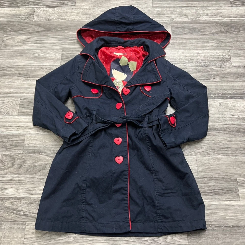 SIGUIENTE Abrigo con capucha azul manga larga abotonada para niña talla 7-8 años Foto 2 de 4