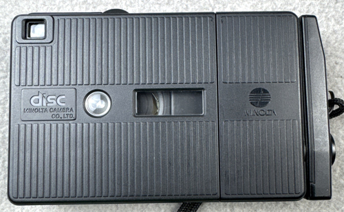 Minolta Disc-7 SELFIE MIRROR fotocamera compact disc pellicola 1983 vintage molto bella - Foto 3 di 12