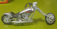 Nouveauté années 1990 inc. Hachoir moto Raked Out. Résine. 10" de long. Très bon état.