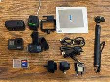 GoPro HERO 7 Black -Action Camera Kit w/ Batteries, Remote Control, Selfie Stick