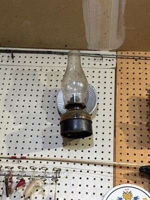 antique oil lamp with wall bracket