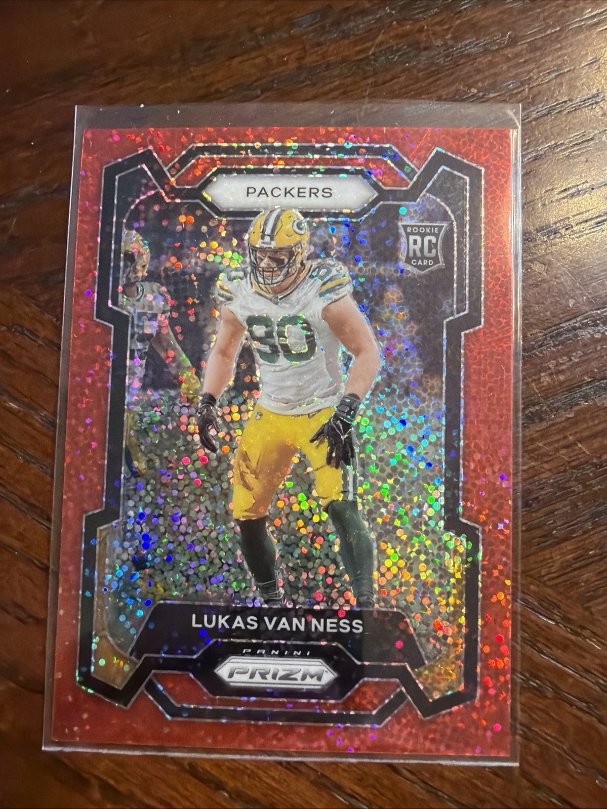 2023 Panini Prizm - Rookie Red Sparkle Prizm #336 Lukas Van Ness (RC)