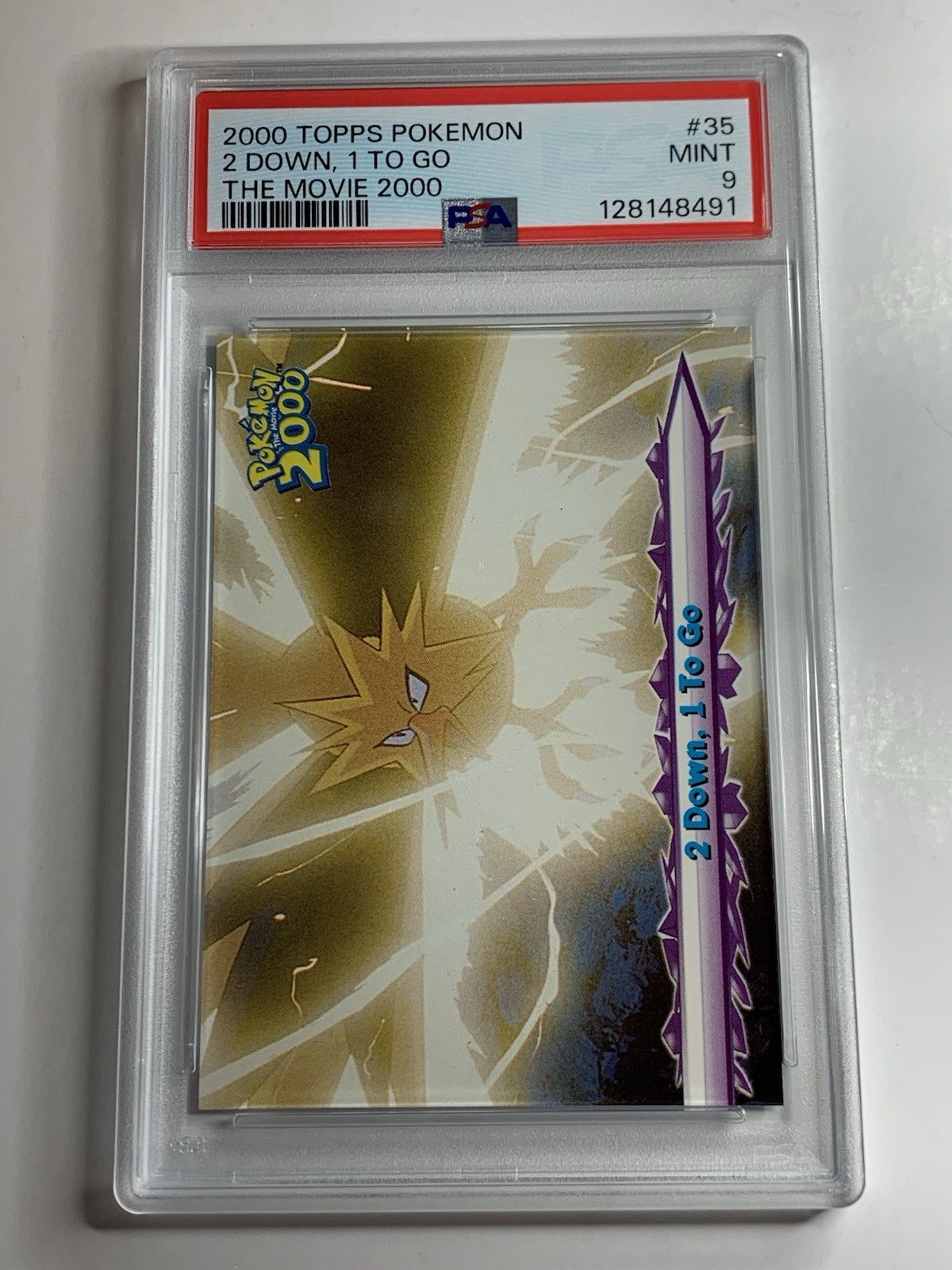 Topps Pokemon the Movie 2000 #35 2 Down, 1 To Go PSA 9 MINT