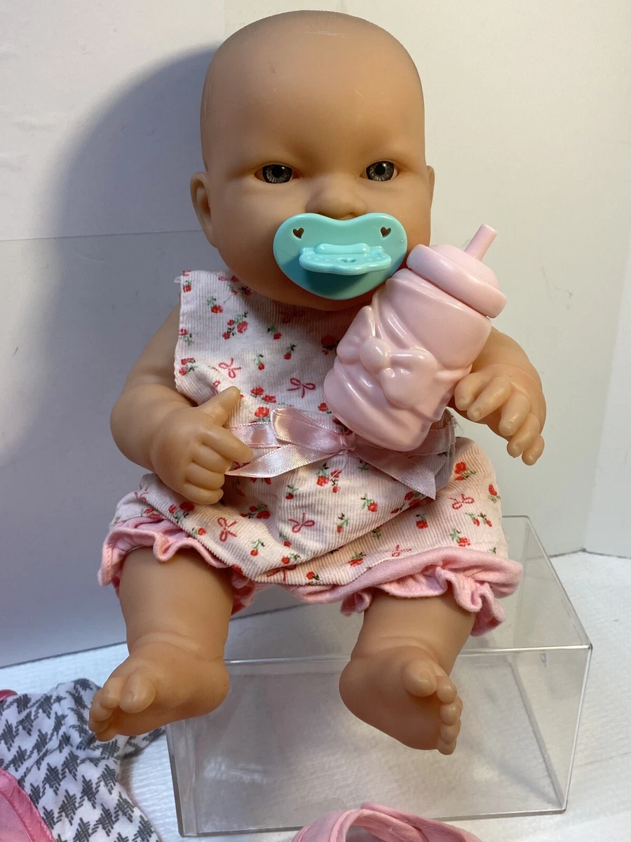Baby doll that drinks bottle sale
