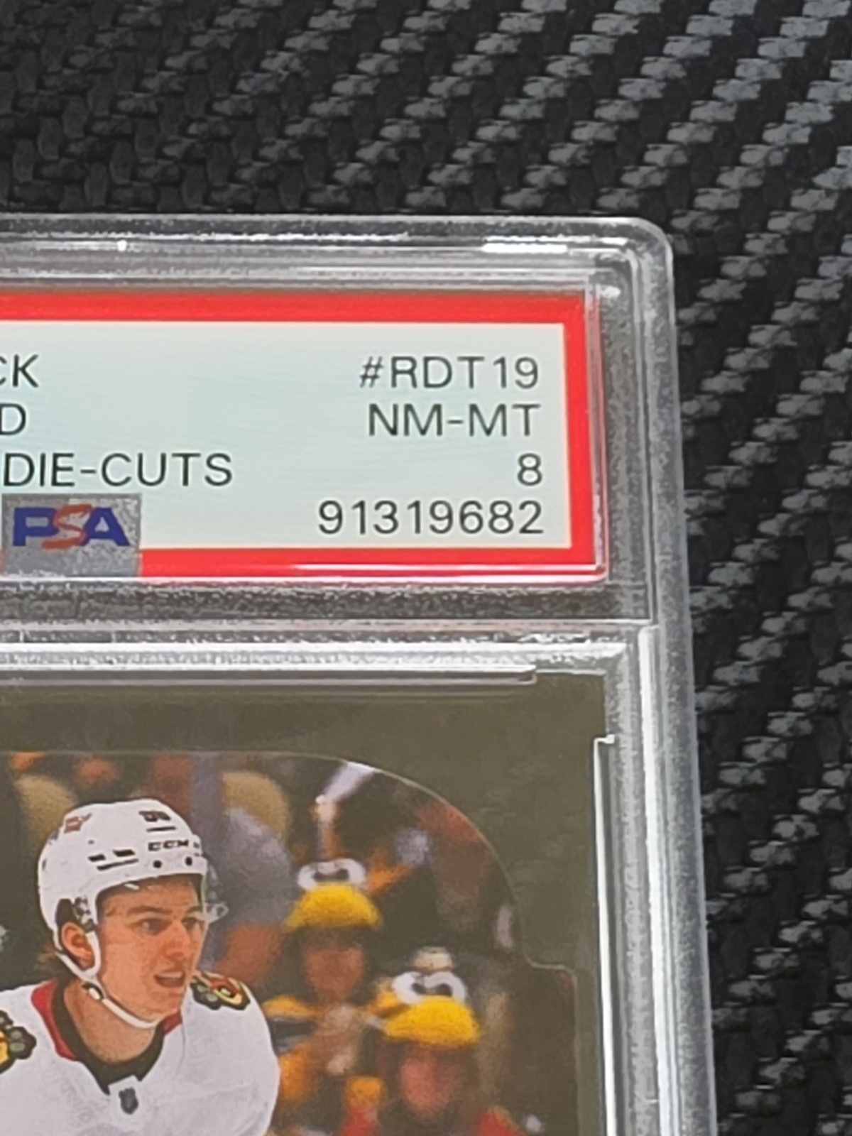 2023 Upper Deck Connor Bedard Blackhawks 94-95 Rookie Die Cuts #RDT19 PSA 8 RC view 2