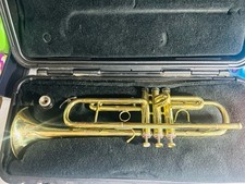 This is a Consair Model 500LR student trumpet. Model 9886 Valves Needs Oiled