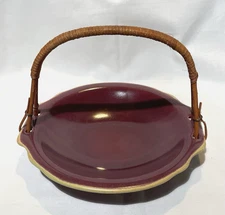 Vintage plum colored 8" serving plate w/ rattan handle, made in germany