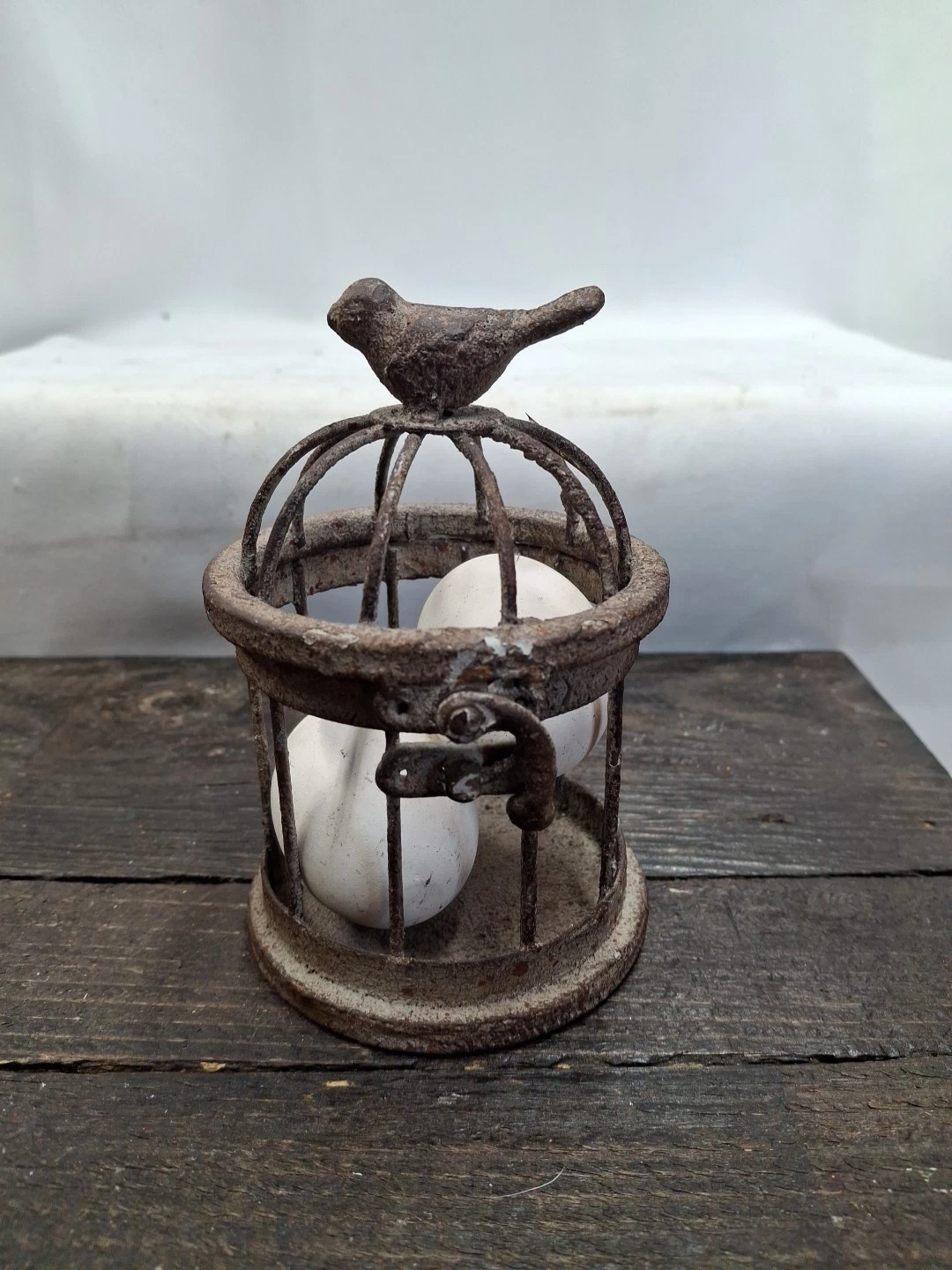 Adorable Small Iron Bird Cage with Bird on Top With 2 Wooden Eggs Inside