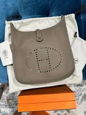 Hermes Evelyne Poche III 33 Clemence Bull Calfskin ETOUPE