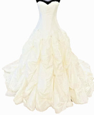 Beautiful and stunning wedding dress designed by famous Maggie Sottero, size 12.
