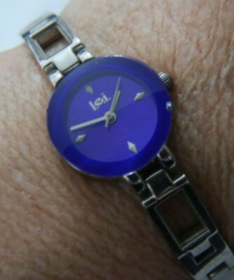 L.E.I. 9284 PURPLE FACE SILVER TONE estate watch, new battery A10