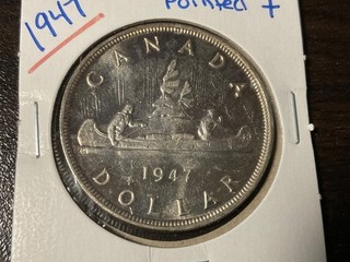 1947 canada silver dollar pointed 7