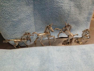 Set Of Four Pewter Unicorns