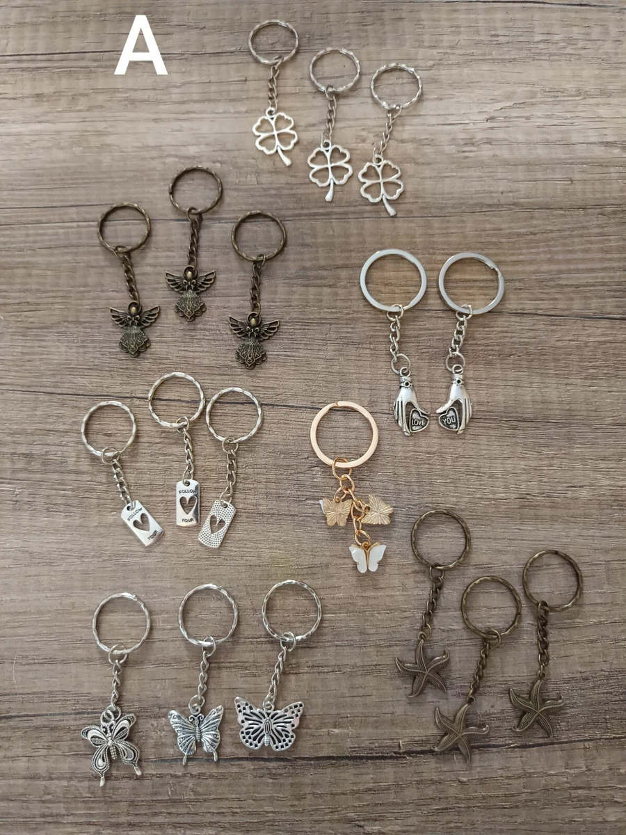 Portachiavi in acciaio inox nero con 3 fiori, portafortuna per donne, amici e colleghi per il compleanno o l'inizio della scuola, regalo di amicizia, argento, S