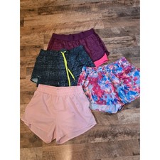Lot of 4 Womens Athletic Running Shorts Pink Floral Purple Textured Size Medium