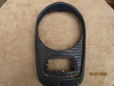 Ford 100e Headlamp surround/ trim