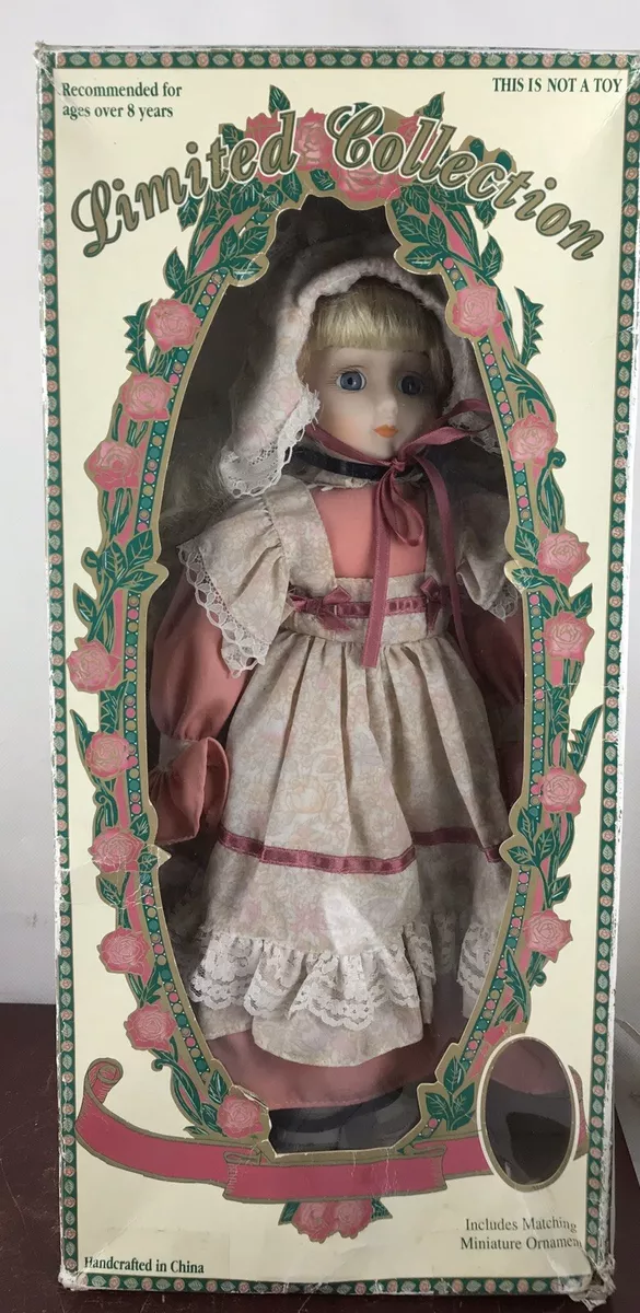 Limited collection genuine porcelain doll and matching miniature ornament hotsell