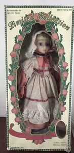 limited collection genuine porcelain doll and matching miniature ornament