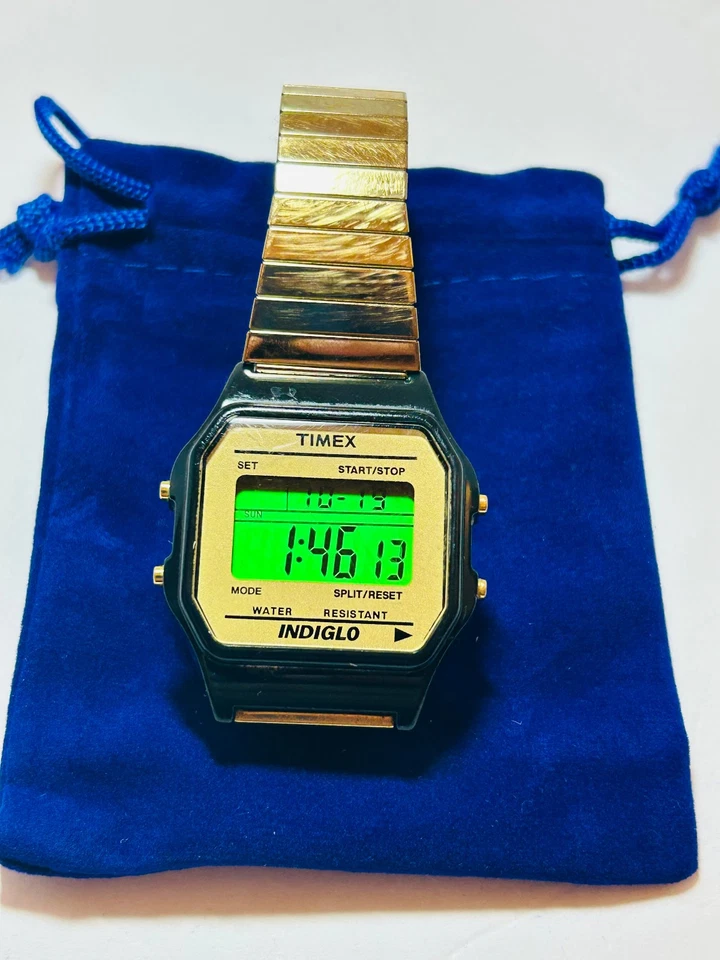 De colección. Reloj Timex Indiglo Hombre/Bisel Resina Negro/Banda Original Tono Dorado/FUNCIONA Foto 2 de 4