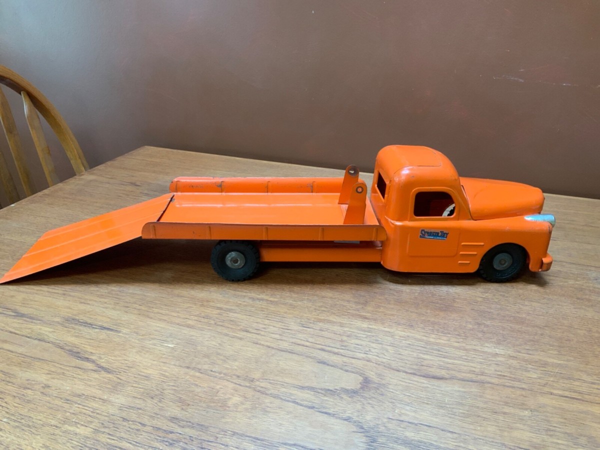 Vintage 1950s Structo Toys Orange Flatbed Tow Truck w/ Ramp