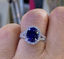 2.00Ct Oval Lab-Created Blue Sapphire Halo Engagement Ring 14K White Gold Plated