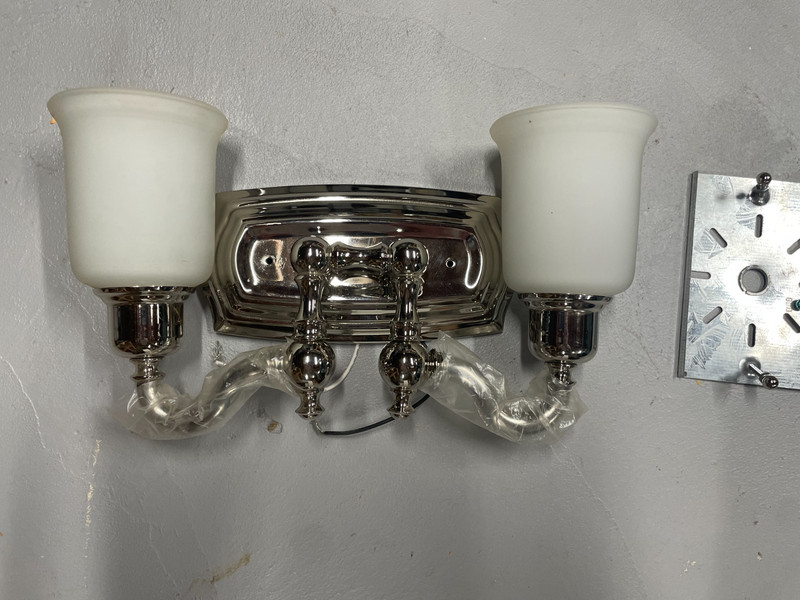 Murray Feiss two light chrome vanity wall sconce.